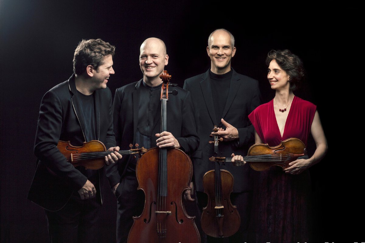 group photo of the chamber music group Cuarteto Casals
