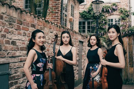 group photo of the chamber music group the Esmé Quartet