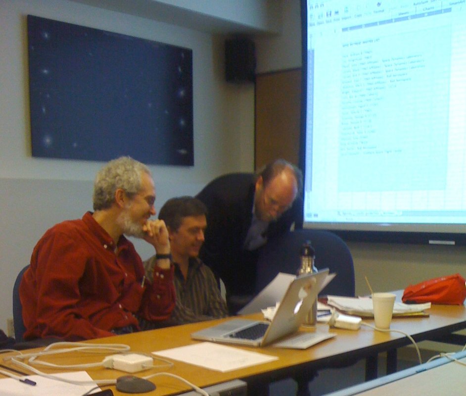From left to right: Peter Eisenhardt, Davy Kirkpatrick, and Ned Wright happily inspect the first spectroscopically confirmed brown dwarf discovered by WISE.